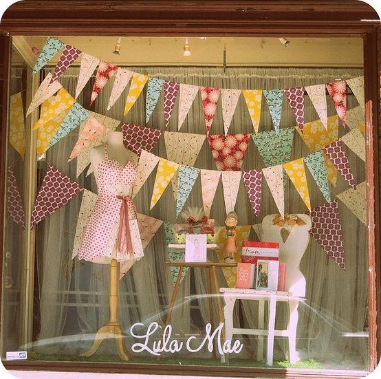 Lula Mae summer window display | Shopify Retail blog