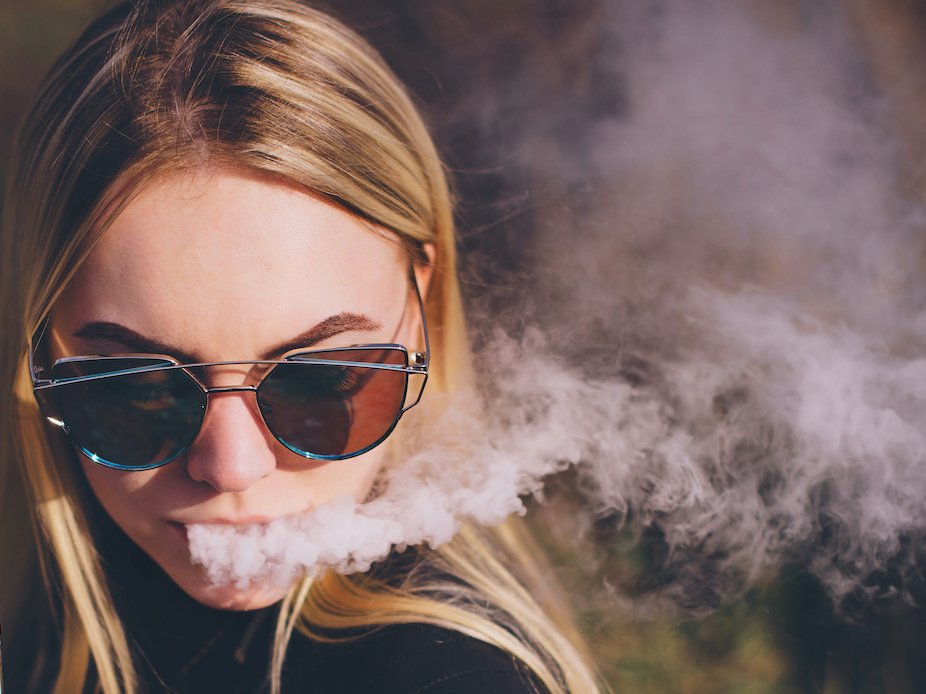 woman vaping vape e-cig