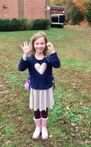 Moorestown, New Jersey second grader Sofia Rubich, 7, celebrates her 40th consecutive day wearing the same outfit to school as part of the One Outfit, 100 Days project.